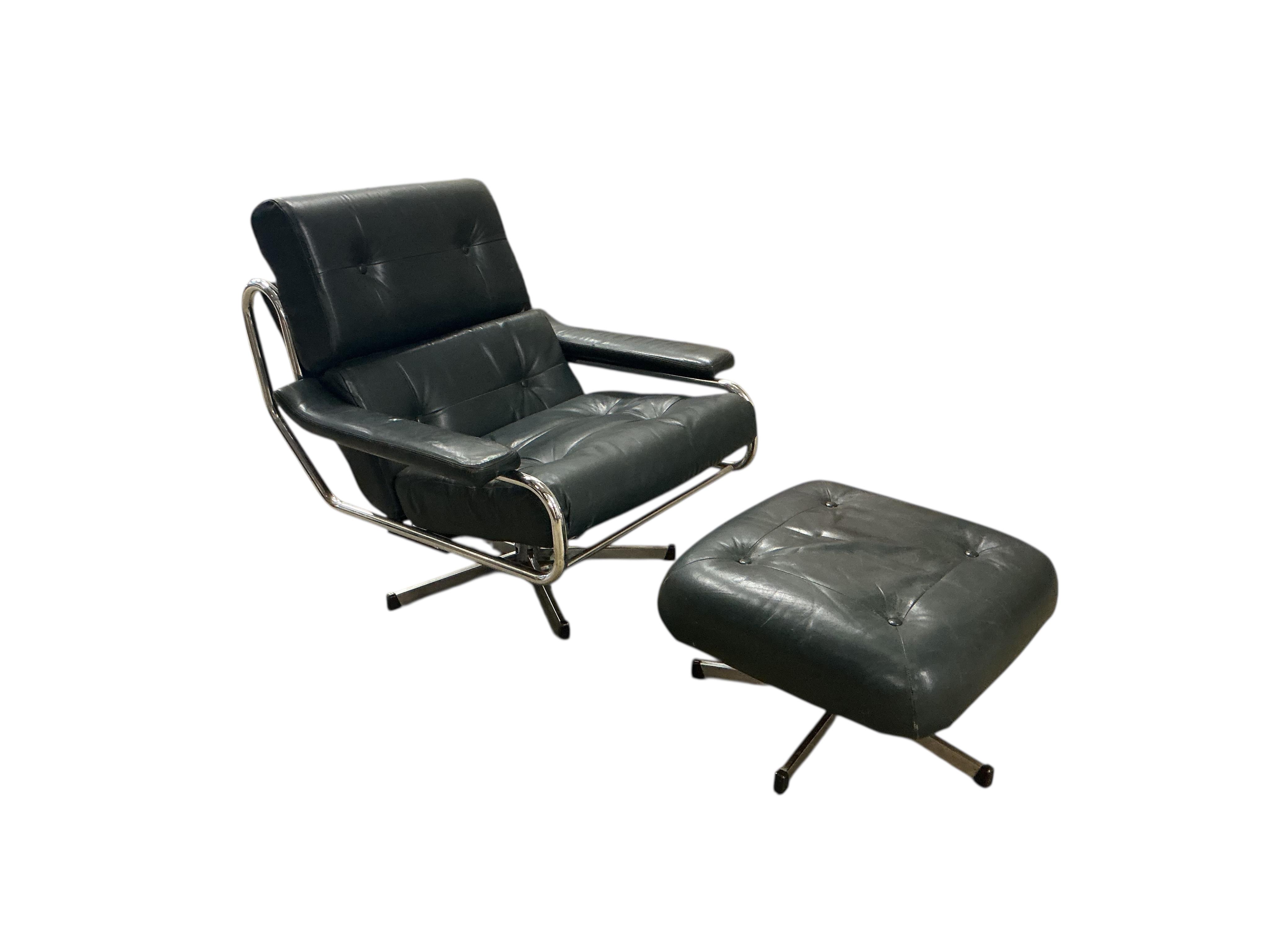 A near pair of mid century Pieff black and green leather swivel lounge chairs on chrome five prong bases, width 86cm, depth 94cm, height 91cm, one with a footstool